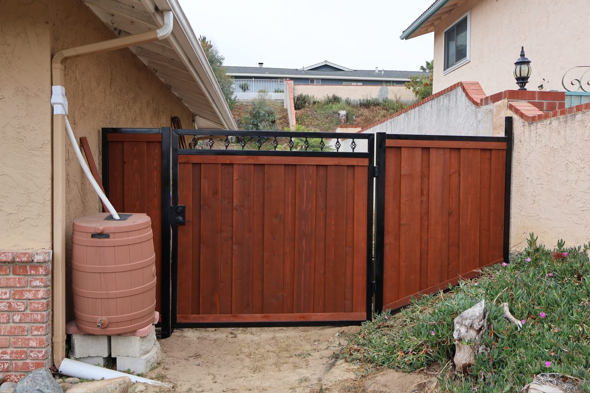Custom wood fence with ornamental iron gate installation San Diego - Top Class Fence